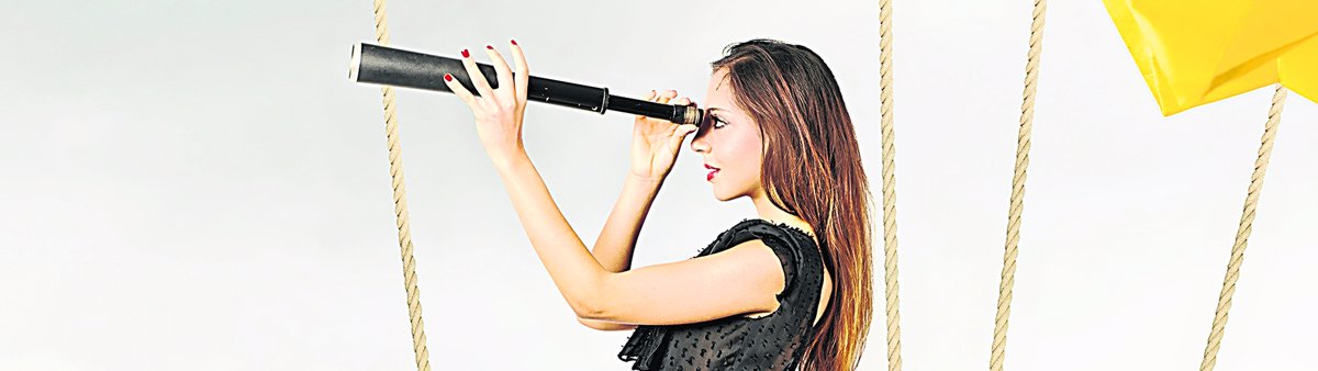 21512341 - girl searching for new fashions with origami