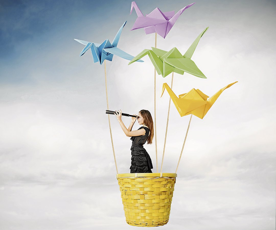 21512341 - girl searching for new fashions with origami