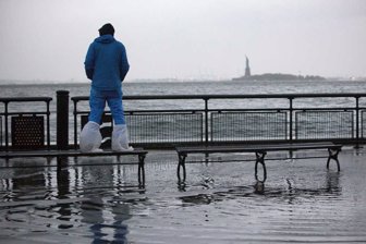 A man watches the ris (26756569)