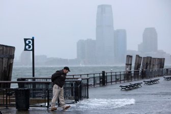 A man walks out of ri (26756570)