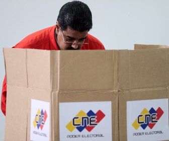 Venezuelan President Nicolas Maduro casts his vote during the Constituent Assembly election in Caracas