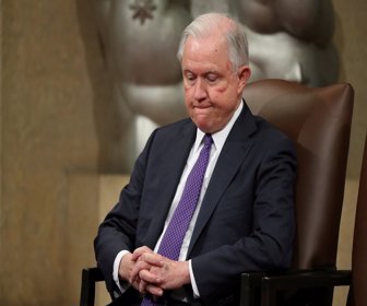 FILE PHOTO: U.S. Attorney General Jeff Sessions waits to speak at a National Opioid Summit at the Justice Department in Washington