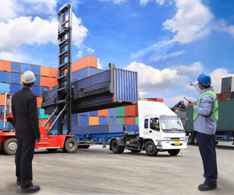forklift handling the container box at dockyard