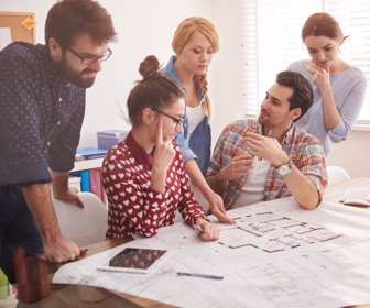 Team of architects have meeting in the office