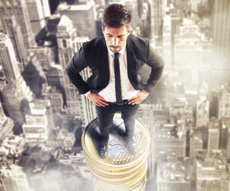 3D Rendering of man over a big stack of coins