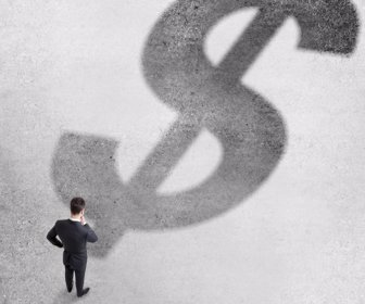 businessman looking to dollar symbol