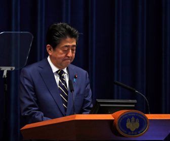 2020-03-28T091756Z_1352060045_RC2XSF94US6Q_RTRMADP_3_HEALTH-CORONAVIRUS-JAPAN-ABE