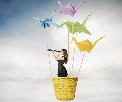 21512341 - girl searching for new fashions with origami